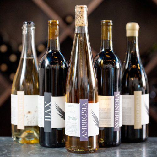 Selection of Eagles’ Landing Winery bottles including red and white wines displayed on a tasting counter