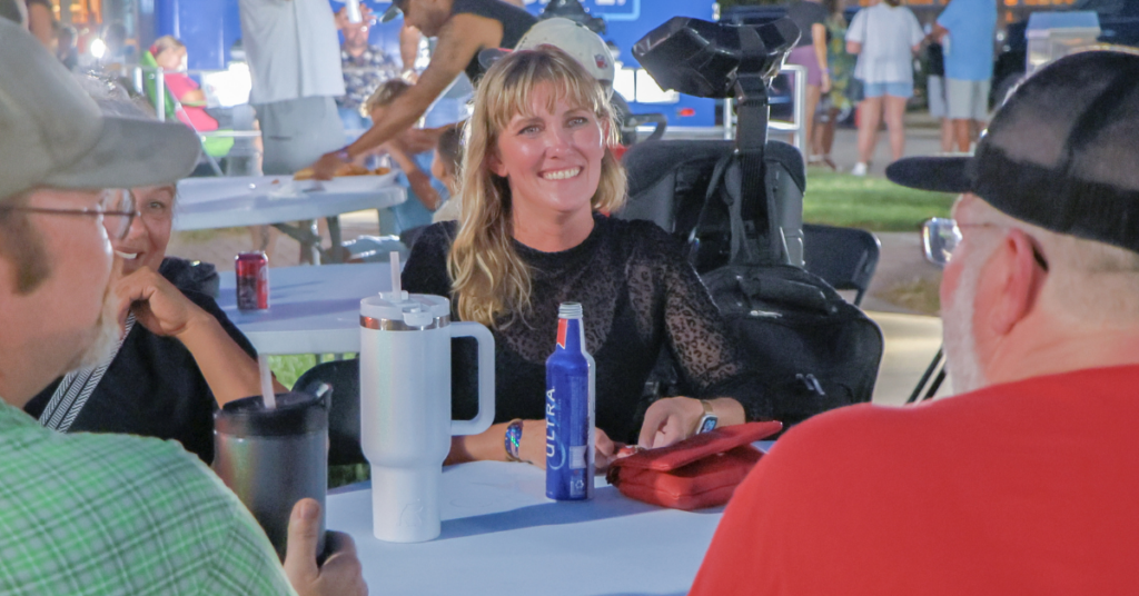 Guests enjoying Friday night festivities at the BBQ & Fly-In on the River in Downtown Excelsior Springs.
