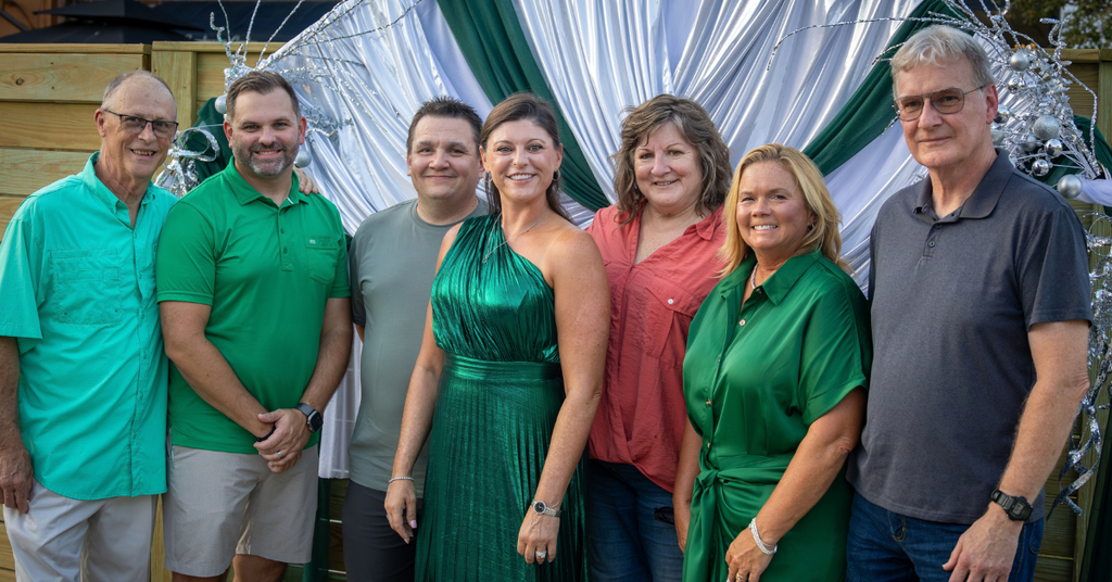Members of the DEP Board of Directors pose together for a picture at the 20th Anniversary Dinner.